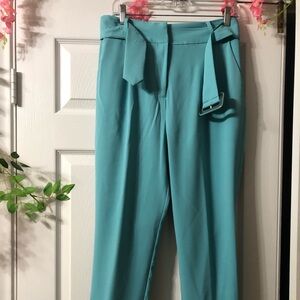 Turquoise dress pants. Ankle length